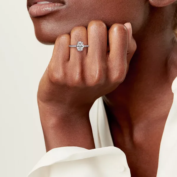 Oval Brilliant Engagement Ring with a Pavé Diamond Platinum Band